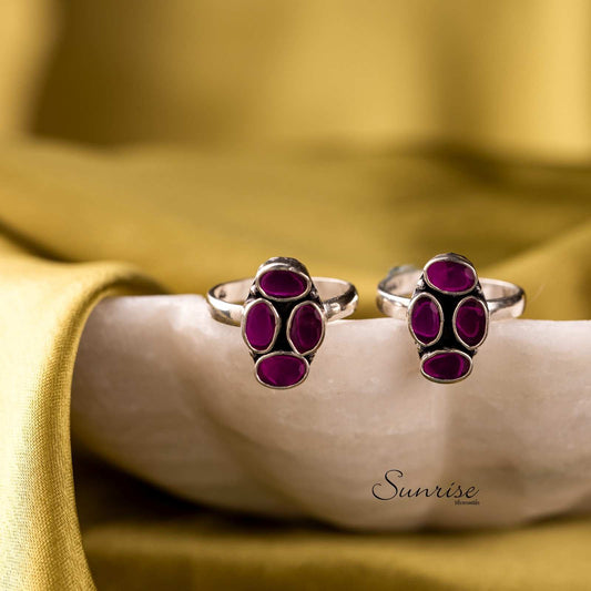 RED CUT STONE TOE RINGS