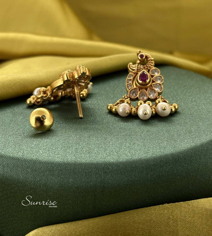 PEACOCK STUDS