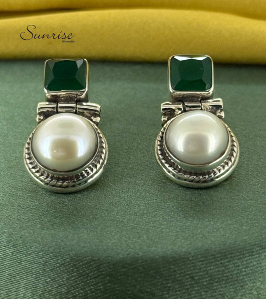 GREEN STONE WITH PEARL STUDS