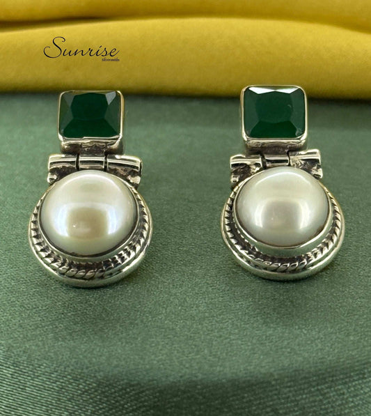 GREEN STONE WITH PEARL STUDS