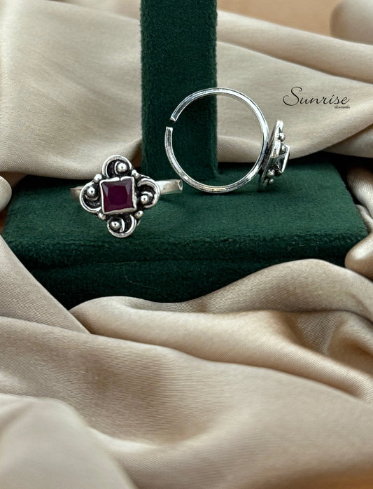 RED CUT STONE TOE RINGS