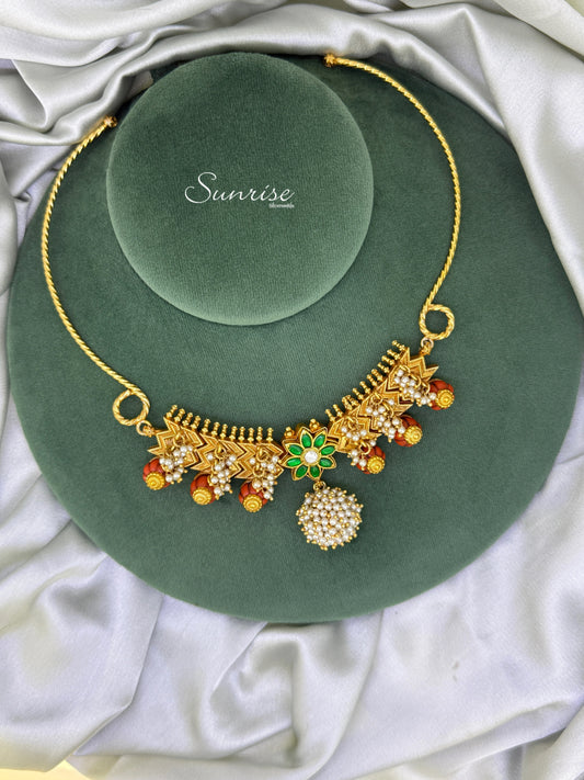 HASLI WITH CORAL NECKLACE