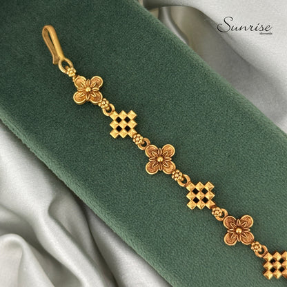 ALTERNATING CROSS AND FLORAL MOTIF BRACELET